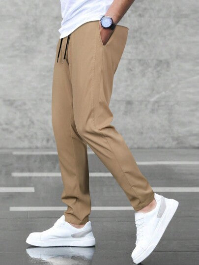 Manfinity Homme Pantalon pour hommes à poches obliques et taille à cordon, pantalon droit unicolore pour le travail, pour mari ou petit-ami, idéal pour l'automne