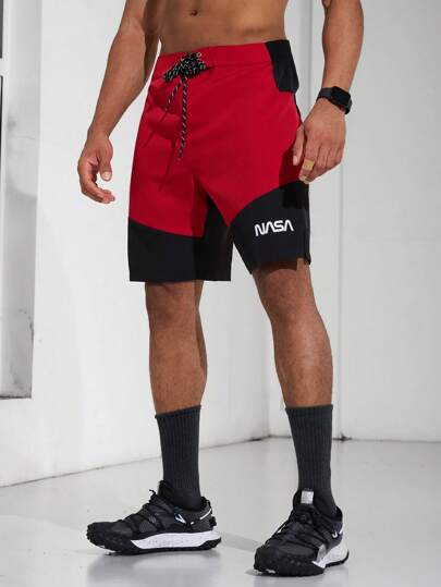 Gym Rark Short de sport style boyfriend pour hommes avec cordon de serrage, bloc de couleurs et imprimé lettres. Short jogger d'été, pantalon de jogging