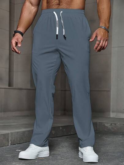 Manfinity CasualCool Pantalon simple de couleur unie pour hommes, pantalon à cordon de serrage pour hommes, pantalon de jogging droit pour hommes, pantalon de jogging droit gris pour hommes, pantalon de jogging pour hommes, pour l'automne