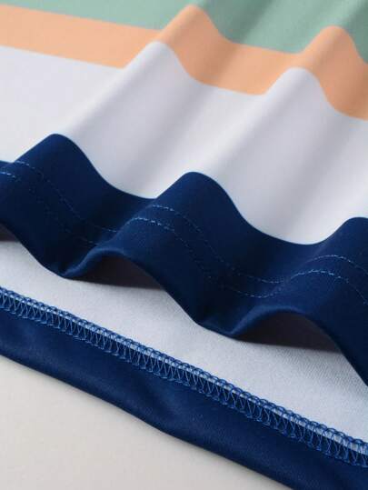Manfinity Homme Polo Shirt à rayures simples et décontracté avec boutons devant pour hommes