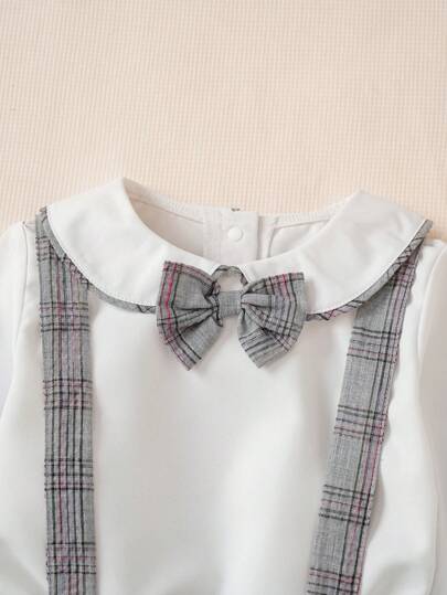 Ensemble chemise à carreaux à manches longues avec col en nœud papillon et pantalon avec bretelles ajustables pour jeune garçon, printemps/automne. Tenue de gentilhomme simple et élégante pour un anniversaire ou une occasion décontractée.