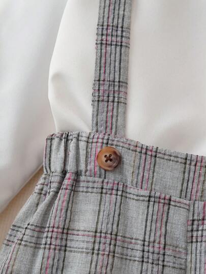 Ensemble chemise à carreaux à manches longues avec col en nœud papillon et pantalon avec bretelles ajustables pour jeune garçon, printemps/automne. Tenue de gentilhomme simple et élégante pour un anniversaire ou une occasion décontractée.