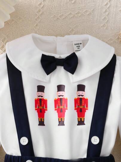 2 pièces Tenue décontractée d'écolier jeune garçon, chemise col mignon à motifs graphiques + short à bretelles réglables. Convient pour le quotidien, l'école, les vacances, les fêtes, les sports, printemps/été/automne/hiver. Épais en polaire, convient pou