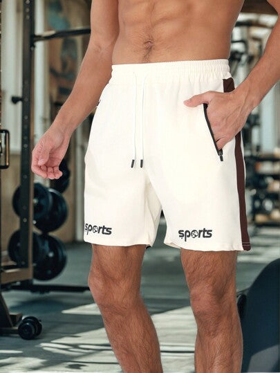 Coreblaze Short de sport à lacets et patchwork de couleur unie pour hommes