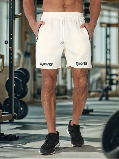 Coreblaze Short de sport à lacets et patchwork de couleur unie pour hommes