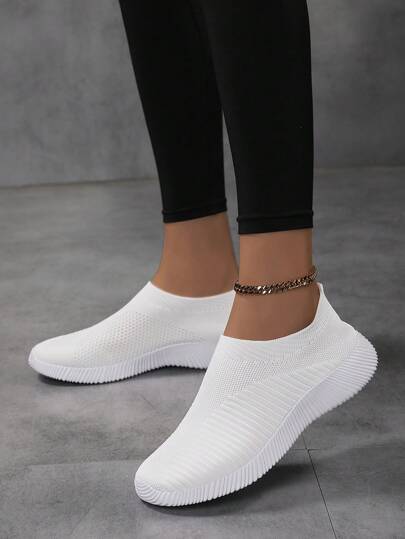 Chaussures plates décontractées en tricot respirant blanc pour femmes, légères et confortables pour un port quotidien
