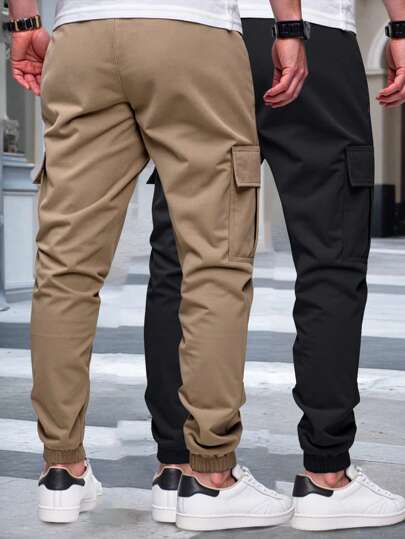Manfinity Homme 2 pièces Pantalon cargo décontracté pour hommes avec poches à rabat et cordon de serrage à la taille. Convient facilement à différentes occasions et besoins de port. La taille est munie d'un cordon de serrage en corde blanche, convenant au