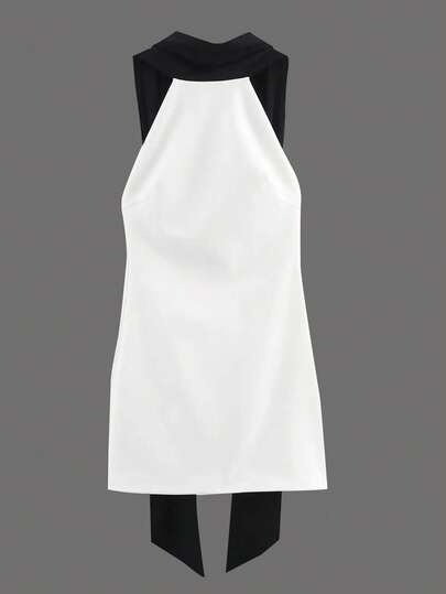 Robe moulante mini dos nu noire et blanche avec nœud, tissu contrasté tressé, élégante pour soirée d'été