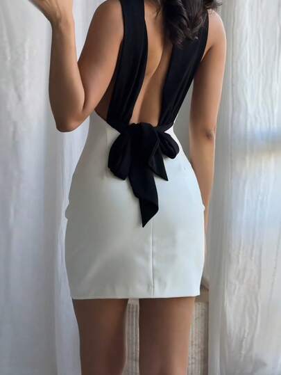 Robe moulante mini dos nu noire et blanche avec nœud, tissu contrasté tressé, élégante pour soirée d'été