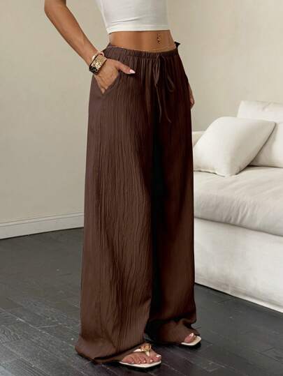 Flirla Pantalon d'été pour femmes, de couleur unie, avec taille élastique et cordon de serrage, avec poches