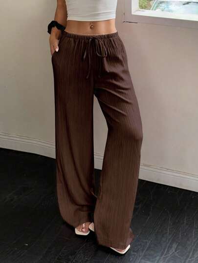 Flirla Pantalon d'été pour femmes, de couleur unie, avec taille élastique et cordon de serrage, avec poches
