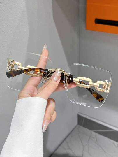 1 paire de lunettes de mode pour femmes, monture carrée sans cadre en métal, élégantes et rétro, verres unis, design de branche avec chaîne imprimé léopard, convient pour ordinateur/lecture/jeux/TV/téléphone, accessoire de lunettes à verres clairs