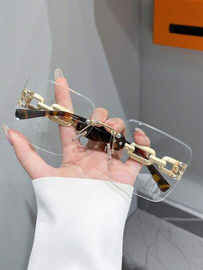 1 paire de lunettes de mode pour femmes, monture carrée sans cadre en métal, élégantes et rétro, verres unis, design de branche avec chaîne imprimé léopard, convient pour ordinateur/lecture/jeux/TV/téléphone, accessoire de lunettes à verres clairs