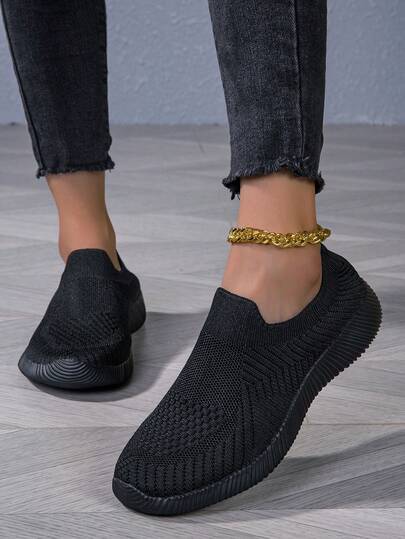 Chaussures plates décontractées respirantes en tricot noir pour femmes, légères et confortables pour un usage casual, sportif et quotidien