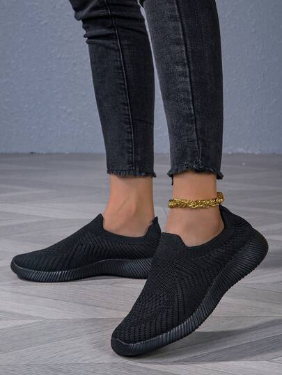 Chaussures plates décontractées respirantes en tricot noir pour femmes, légères et confortables pour un usage casual, sportif et quotidien