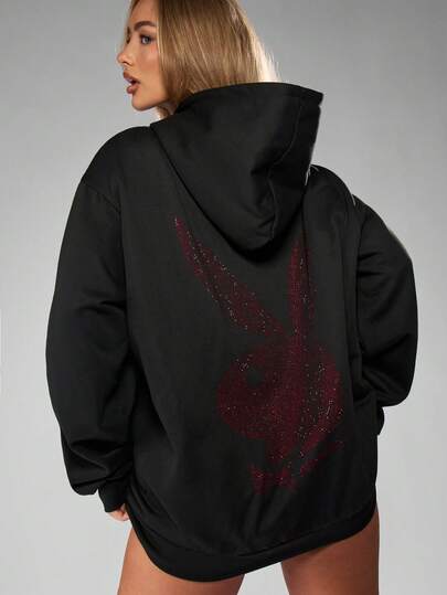 Missguided x Playboy Robe sweat-shirt à capuche oversize pour femmes avec strass en forme de lapin. Robe Sweat-shirt mini pour l'automne, l'hiver, les soirées, les sorties en club et la mode de rue. Robe mini à manches longues et capuche