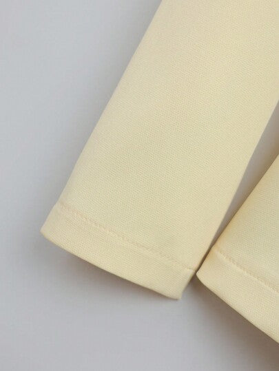 GlowEve Blazer décoré de boutons dorés pour femmes + Jupe plissée Élégant Polyvalent pour le travail et le quotidien Style minimaliste Ensemble 2 pièces Jaune