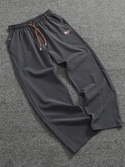 Pantalon décontracté pour hommes, taille avec cordon de serrage, poches obliques, couleur unie, léger