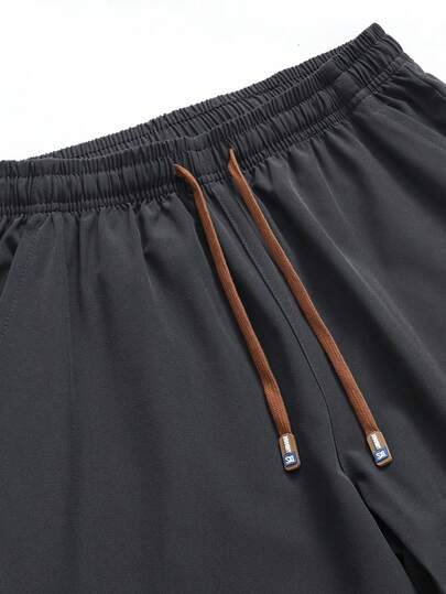 Pantalon décontracté pour hommes, taille avec cordon de serrage, poches obliques, couleur unie, léger