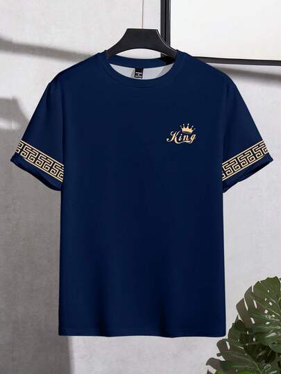 Calvornis T-shirt à manches courtes pour hommes bleu marine polyvalent classique, avec un motif floral et une icône "King" dorée sur le poignet. Style de rue mature et cool