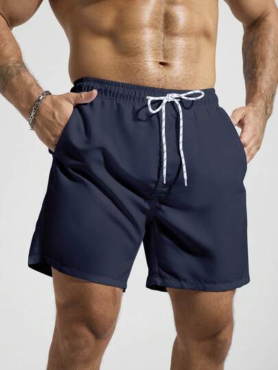 Manfinity KASUA Short de plage style vacances d'été pour hommes, taille à cordon de serrage, poches obliques, maillot de bain bleu royal, maillot de bain bleu pour hommes, tenue de plage pour hommes, maillot de bain uni, vacances