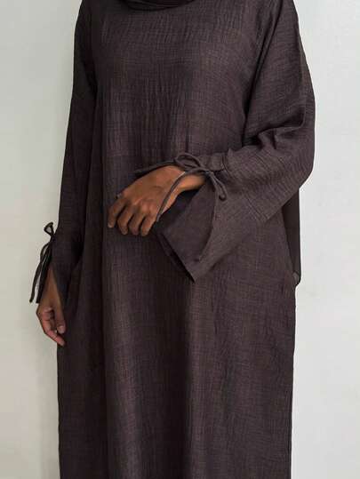 Abaya Ramadan Dubaï turque de couleur unie, robe décontractée à manches longues avec poignets fendus et taille nouée, coupe ample pour femmes, printemps et automne, marron