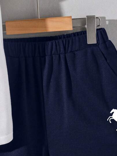 2 pièces Ensemble de t-shirt polo à manches courtes ample avec motif de dessin animé sur le col et short pour garçons