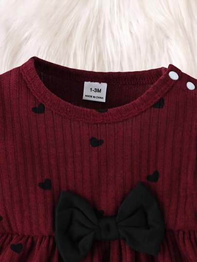 Ensemble 2 pièces de Top à manches bouffantes en tricot avec imprimé cœur brun doux et nœud noir, assorti à un pantalon skinny noir avec nœud, adapté pour les sorties, le casual, les sports, les fêtes de Noël, pour nouveau-nés en automne/printemps