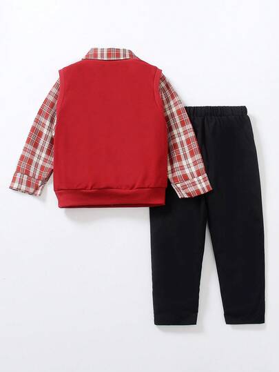 Tenue de gentleman pour jeune garçon (petit) : Top : Superposé avec une chemise à carreaux rouges et blancs avec col, gilet tricoté rouge col en V avec un imprimé de dinosaure blanc mignon pour une touche ludique. Bas : Pantalon noir, simple et net. Style