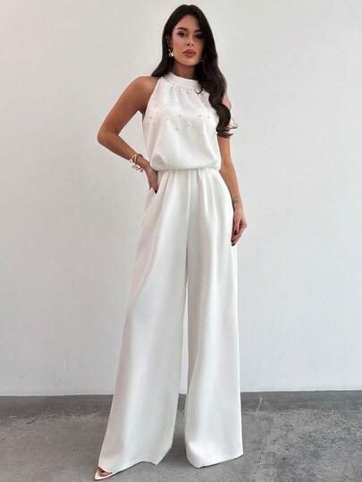 Firerie Pantalon large à col Mao blanc sans manches avec décoration de perles, coupe slim pour femmes. Combinaison blanche romantique avec perles, combinaison sans manches. Tenue de bureau élégante pour femmes, idéale pour une cérémonie de remise des dipl