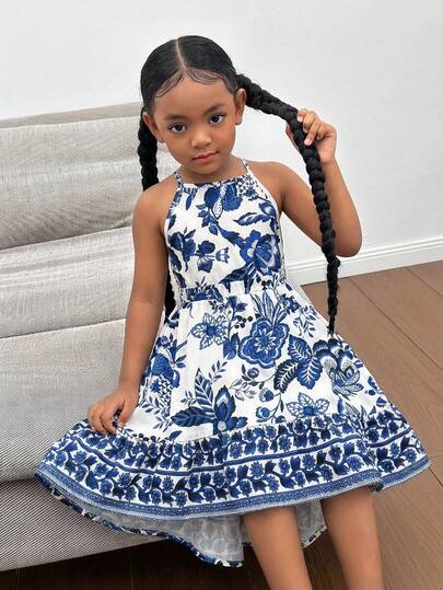 Robe élégante et minimaliste à imprimé floral sans manches avec encolure ras-du-cou pour jeune fille
