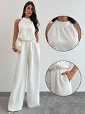 Firerie Pantalon large à col Mao blanc sans manches avec décoration de perles, coupe slim pour femmes. Combinaison blanche romantique avec perles, combinaison sans manches. Tenue de bureau élégante pour femmes, idéale pour une cérémonie de remise des dipl