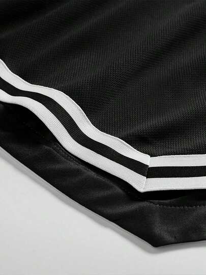 Shorts de sport pour hommes, shorts d'entraînement coupe ample avec poches latérales, design à ourlet rayé pour la salle de sport, le fitness, la course et les sports