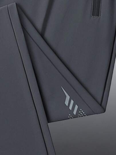 Pantalon de sport d'extérieur décontracté d'été pour hommes, tissu élastique frais et confortable, avec taille élastique à cordon de serrage et poches zippées sécurisées, convient pour un port quotidien