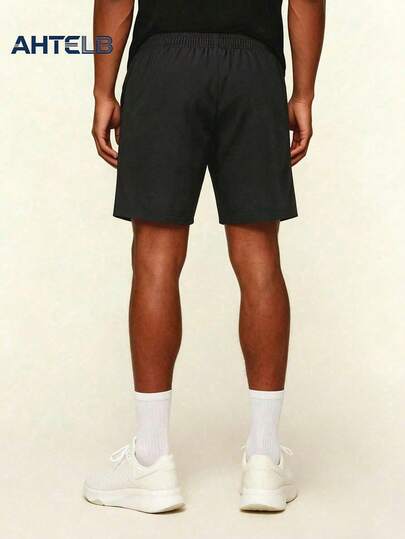 AHTELB Short de sport d'été en soie de glace respirant et séchage rapide pour hommes, avec poches zippées anti-vol, design à cordon de serrage, imprimé lettres, short bermuda pour course en plein air et fitness, convient pour l'entraînement quotidien et l