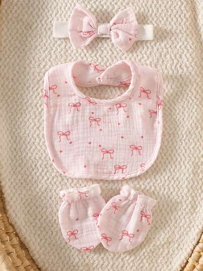 3 pièces Ensemble mignon de tenues en mousseline rose clair pour bébé fille. Barboteuse à volants avec boutons-pression, bandeau et bavoir avec imprimé nœud doux. Cadeau de douche de bébé en coton doux. 0-12 mois