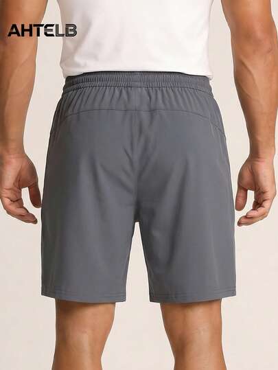 Short de sport en soie de glace à séchage rapide pour hommes AHTELB, avec poches zippées, léger et respirant, short de sport décontracté, convient pour la salle de sport, la course, l'exercice et le port quotidien en été, jogging pour hommes, pantalon lon