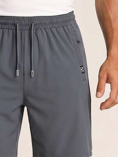 Short de sport en soie de glace à séchage rapide pour hommes AHTELB, avec poches zippées, léger et respirant, short de sport décontracté, convient pour la salle de sport, la course, l'exercice et le port quotidien en été, jogging pour hommes, pantalon lon