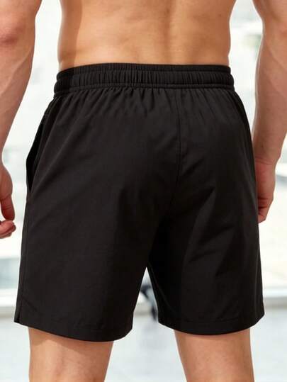 Short de sport décontracté noir pour homme avec poches zippées et imprimé éclair