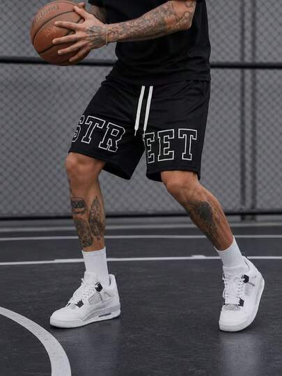 Shorts en maille noir à imprimé graphique audacieux pour hommes, shorts de basket-ball décontractés et amples, bas de streetwear à cordon de serrage pour sports d'été