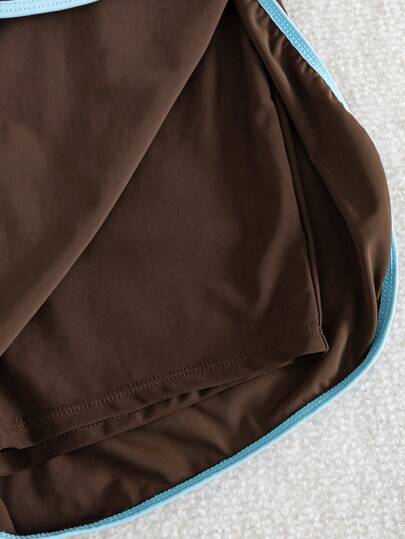 Swim Basics Shorts de plage décontractés et sportifs pour femmes Springbreak, noir et blanc avec bordure blocs de couleurs