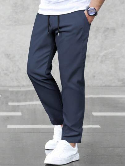 Manfinity Homme Pantalon décontracté pour hommes de couleur unie avec cordon de serrage à la taille et poches, polyvalent, automne