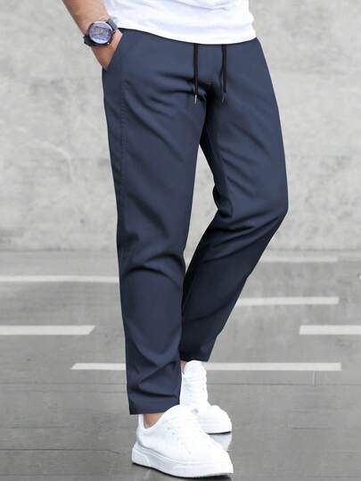Manfinity Homme Pantalon décontracté pour hommes de couleur unie avec cordon de serrage à la taille et poches, polyvalent, automne