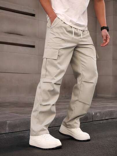 Manfinity Homme Pantalon cargo pour hommes à taille élastique et poches, couleur unie, automne
