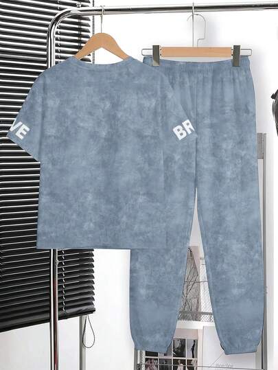 Ensemble T-shirt et pantalon long décontracté, confortable et minimaliste pour garçon préadolescent, col ras-du-cou, manches courtes, imprimé dégradé tie-dye classique et cool, imprimé graphique texte BRAVE, style beau et à la mode, adapté au printemps/ét