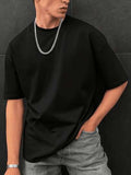 T-shirt à manches courtes de couleur unie pour hommes, adapté pour l'été, confortable et respirable, style
