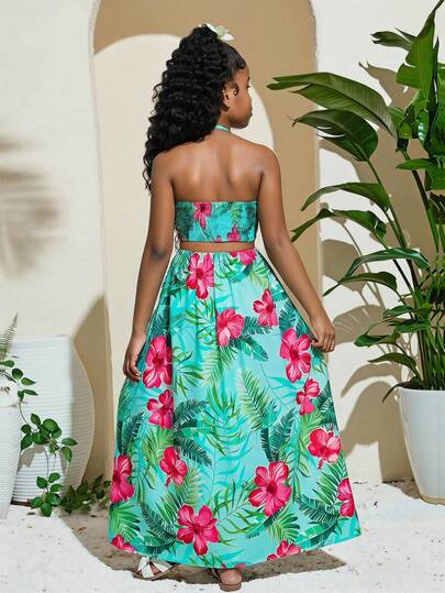 Robe maxi à col ras-du-cou avec découpes pour adolescentes, motif floral tropical sur base bleue (col ras-du-cou + découpe à la taille + jupe évasée). Tissu doux, convient pour le printemps/l'été/l'automne. Éléments de style de villégiature frais et silho