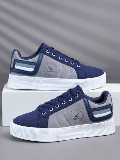 Chaussures de skateboard basses blocs de couleurs pour hommes, baskets décontractées à lacets, chaussures de sport plates de rue, chaussures de skate patchwork bleu marine & gris pour le trajet quotidien