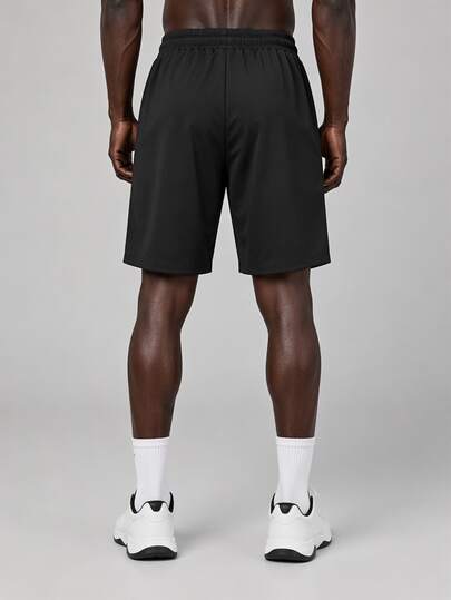 Coreblaze Short de sport noir pour hommes avec patchwork de lignes, imprimé d'étoiles et cordon de serrage